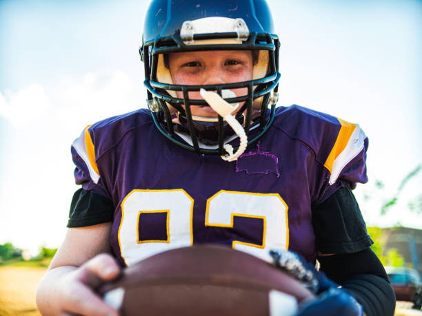 istock Junior Football player during game 1253696425