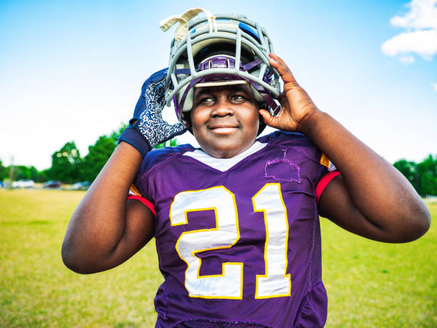 istock Junior Football player during game 1253696565