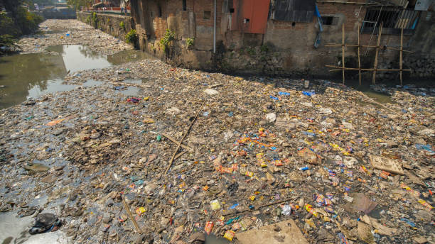 istock Dirty river in Dharavi slums. Mumbai. India 1253701207