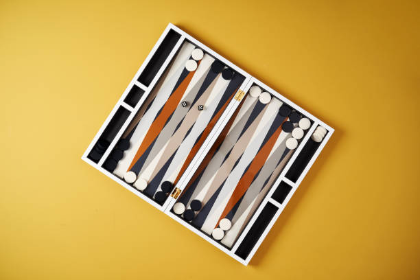 Board game backgammon. Open backgammon game with dice Board game backgammon. Open backgammon game with dice, close-up backgammon stock pictures, royalty-free photos & images