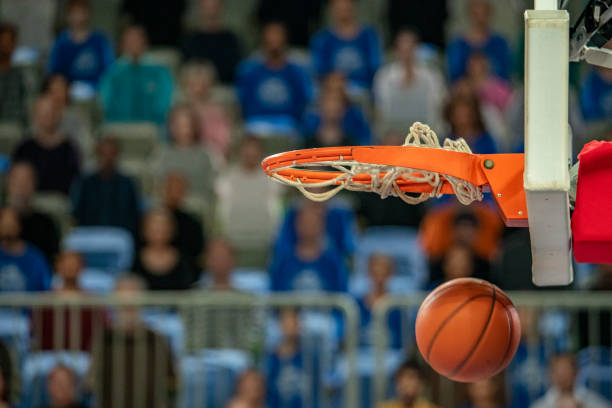 istock Basketball in hoop 1253703824