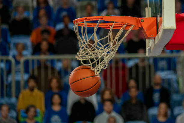 istock Basketball in hoop 1253703880