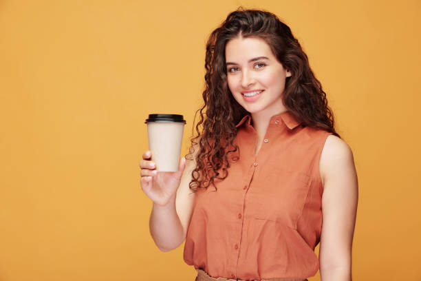 istock Girl drinking coffee to go 1253704707