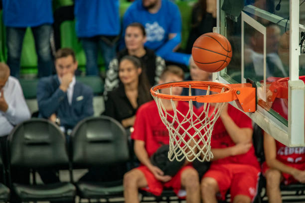 istock Basketball in hoop 1253705858