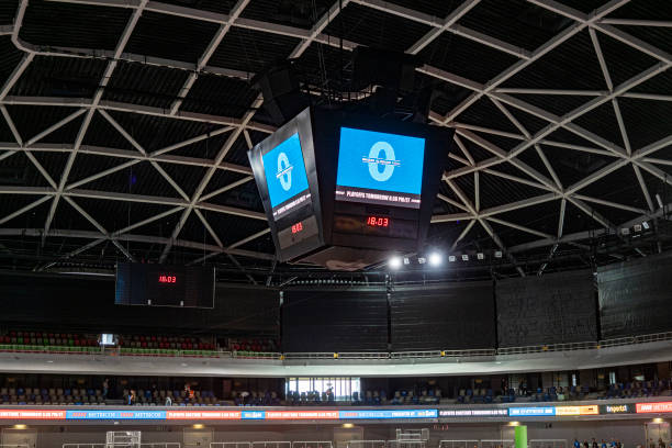 Digital scoreboard in court View of digital scoreboard with empty stands in the stadium. scoreboard stock pictures, royalty-free photos & images