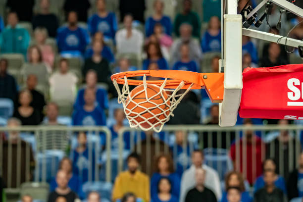 istock Basketball in hoop 1253708523