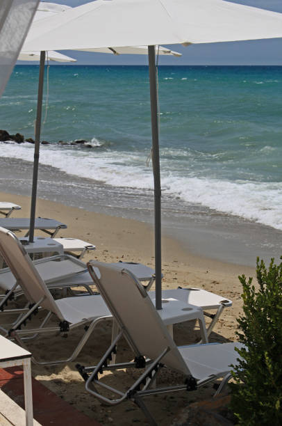 istock Skala Fourka beach with sunbeds 1253708962