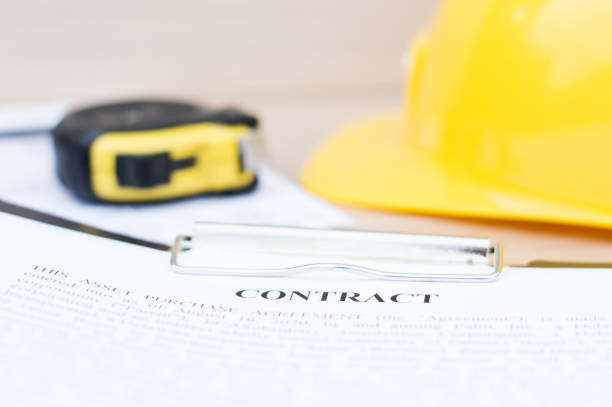 istock Close-up of a contract for a construction project. Real estate, business 1253710114