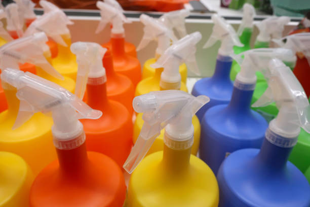 istock multi-colored bottles with a spray for disinfection 1253710535