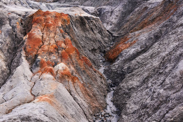 istock gully in a clay slope devoid of soil 1253711396