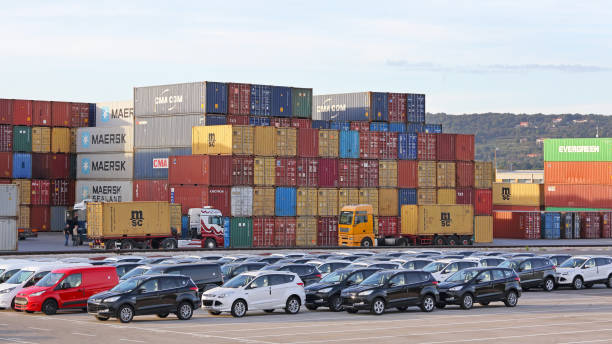 Cars Cargo Terminal Koper, Slovenia - October 14, 2014: New Cars and Cargo Containers at Terminal Port in Koper, Slovenia. koper slovenia stock pictures, royalty-free photos & images