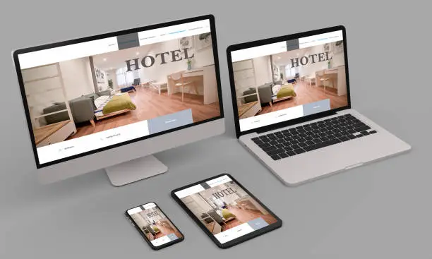 Photo of Laptop, mobile and tablet 3d rendering showing hotel responsive web design .3d illustration