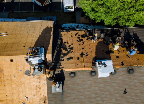 istock Remove old shingle roof and applying new shingles with apartment 1253712702