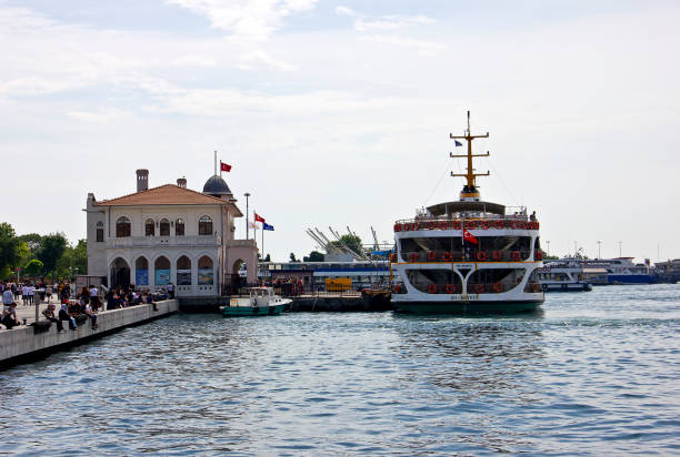 Istanbul, Turkey - June 14, 2020: People are getting inside the boat in Kadikoy ferry port on marmara sea in summer at kadıköy istanbul.