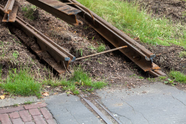 istock Liquidation of old rusty tram tracks, replacement for modern ones 1253719104