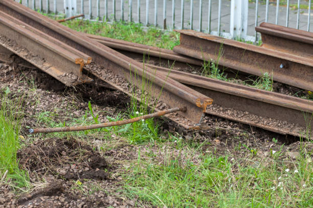 istock Liquidation of old rusty tram tracks, replacement for modern ones 1253720324