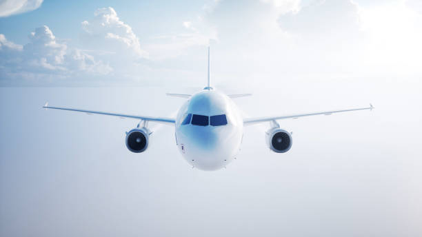 istock Passenger flying Plane . Daylight, clouds. A condensation trail of an airplane. 3d rendering. 1253721288