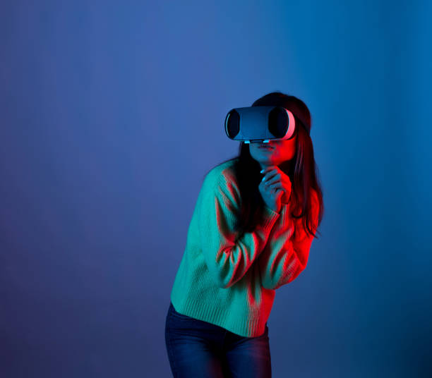 istock Young woman wearing a vr is making affraid gesture 1253721402