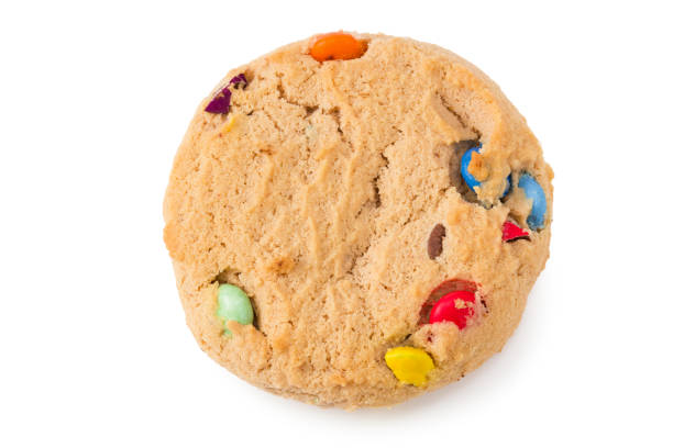 istock Chocolate chip cookies isolated on white background. Sweet biscuits. top view 1253723053