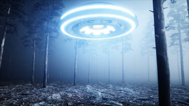 istock UFO in fog night forest. landing place. 3d rendering. 1253725073