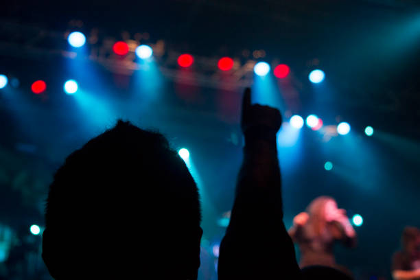 istock Filming concert on smart phone 1253726472
