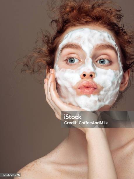 Young Woman Applies Beauty Mask Stock Photo - Download Image Now - Beauty, Mask - Disguise, Human Face