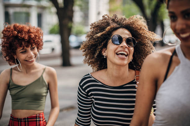 istock Three beautiful ladies in city 1253726788