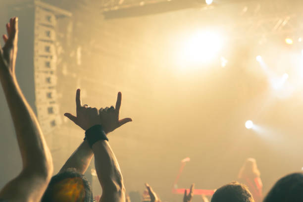 istock Filming concert on smart phone 1253727783