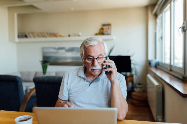 istock Senior man adapting to a modern era of technology 1253727986