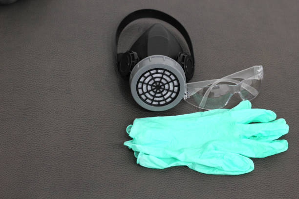 istock breathing mask, gloves and protective glasses, personal protective equipment 1253729797