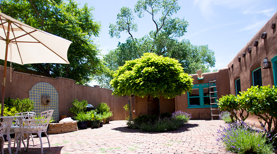 Santa Fe NM Style: Adobe house courtyard with fountain