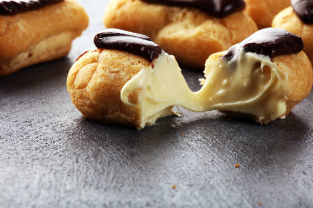 istock Traditional French dessert. Eclair with chocolate icing. Pastery dessert concept 1253730791