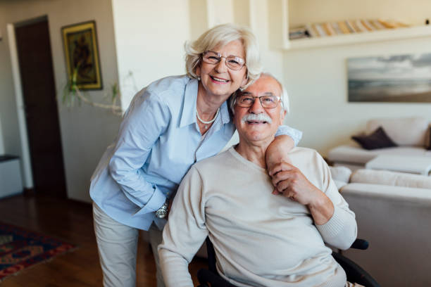 Portrait of a senior couple taking care of each other stock photo
