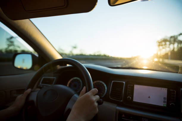istock Driving car on sunrise highway 1253730860