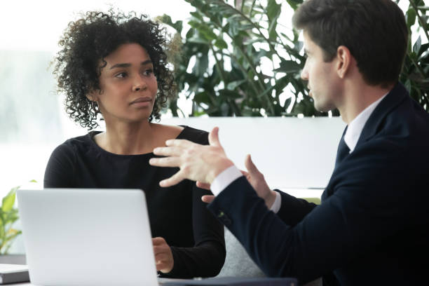 istock Diverse business man and woman working and discussing project together 1253731496