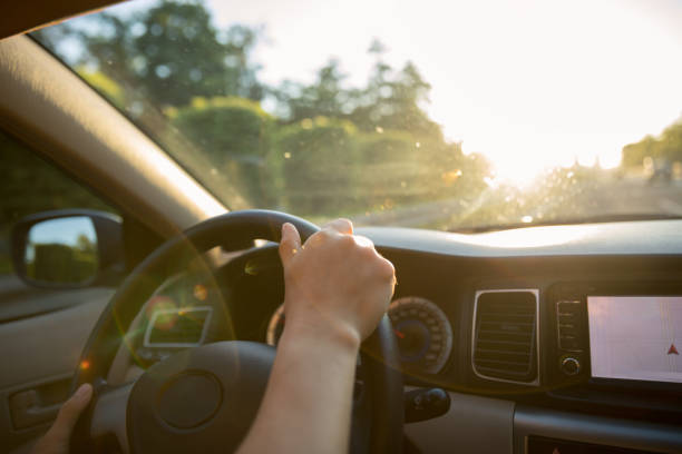 istock Driving car on sunrise highway 1253732579