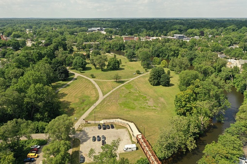 Aerial view of the Huron River, Depot Town and Riverside Park in Ypsilanti, MI.