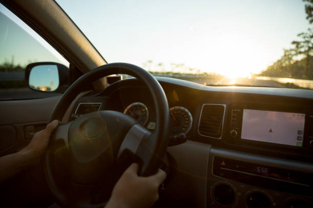 istock Driving car on sunrise highway 1253736676