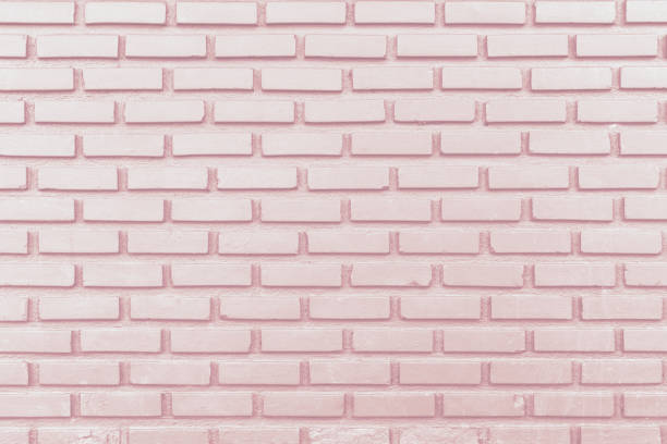 istock Cream color brick wall texture background. 1253739431