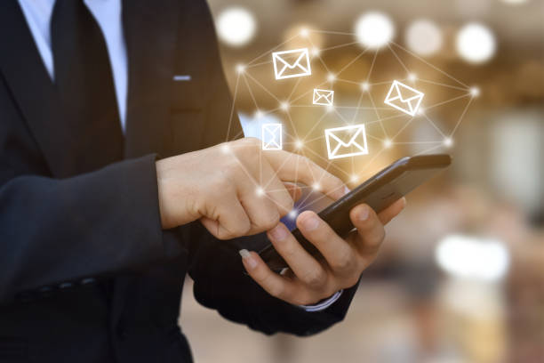 istock CONTACT US. Businessman hand using mobile smartphone 1253739576