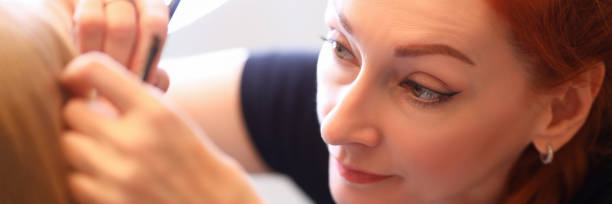 istock Female specialist working with face 1253740328