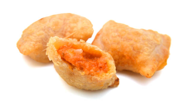 istock A serving of bite size pizza rolls isolated on a white background. 1253741848