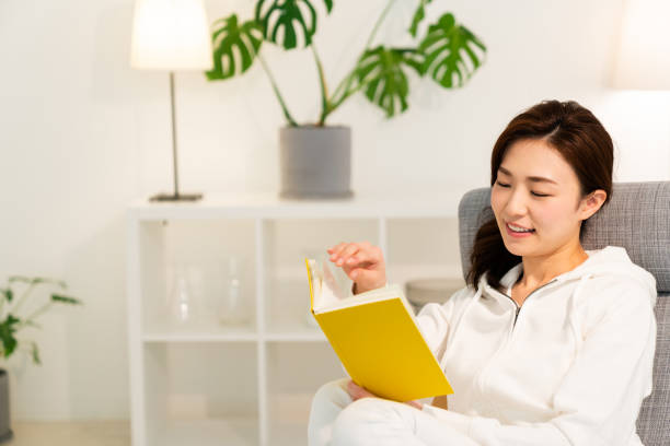 istock asian woman who reads a book 1253752774