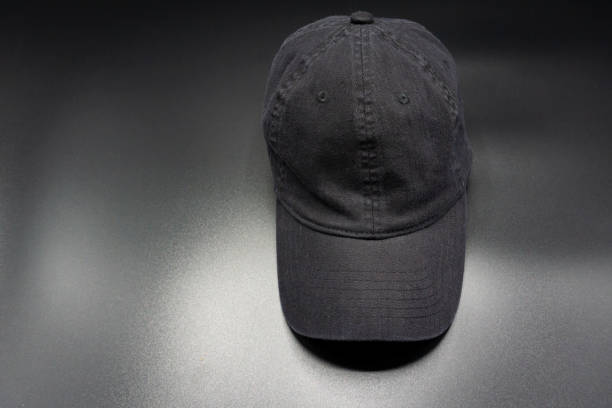 istock Black baseball cap. Top front view, isolated on gray background 1253759052