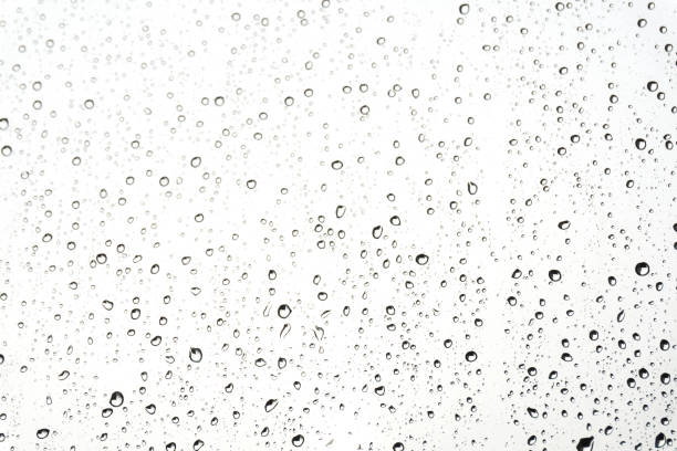 Water drops on glass. Rain droplets on window surface