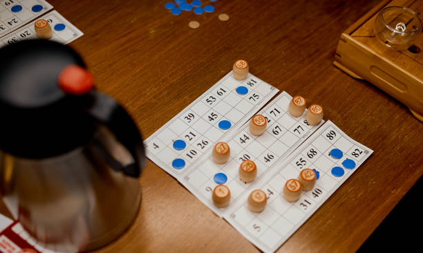istock Lotto game in the process with barrels on display on a wooden table 1253761977