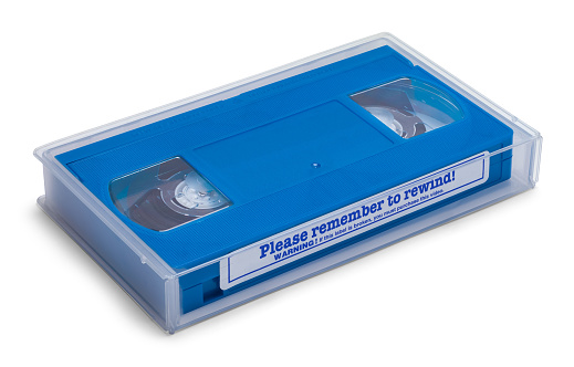 Blue VHS Rental Tape in Clear Case Isolated on White.