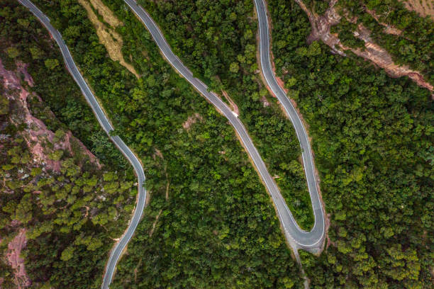 istock Road in the mountains directly from above 1253776982