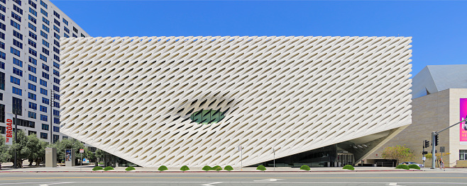 Los Angeles, USA - May 4, 2020:  Day time panoramic view of the the modern exterior facade of The Broad - a contemporary art  museum located on Grand Avenue in downtown Los Angeles (opened 2015).