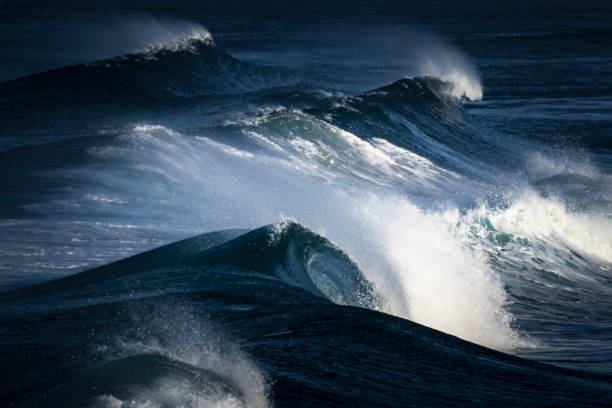 istock A large ocean wave breaking near shore 1253793771
